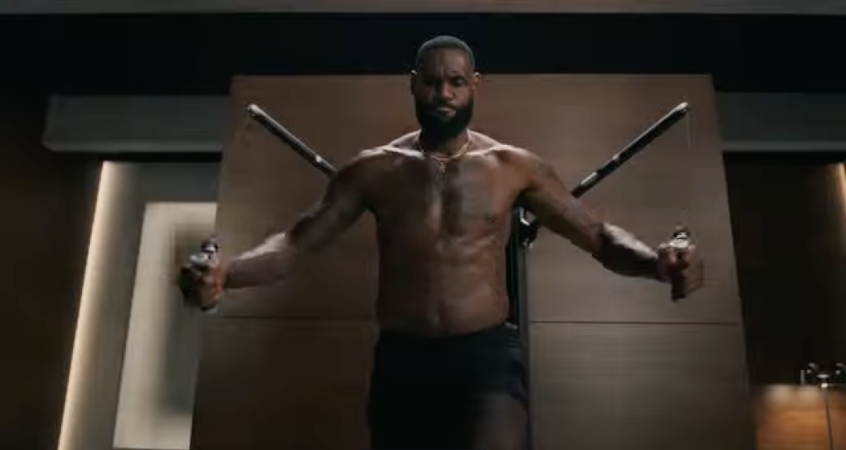 LeBron James training on Tonal with dual cable handles extended